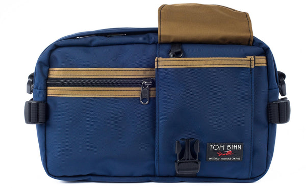 The LGD in Deep Blue/Coyote/Coyote. Front view, front buckle pocket lifted up to show the Coyote lining.